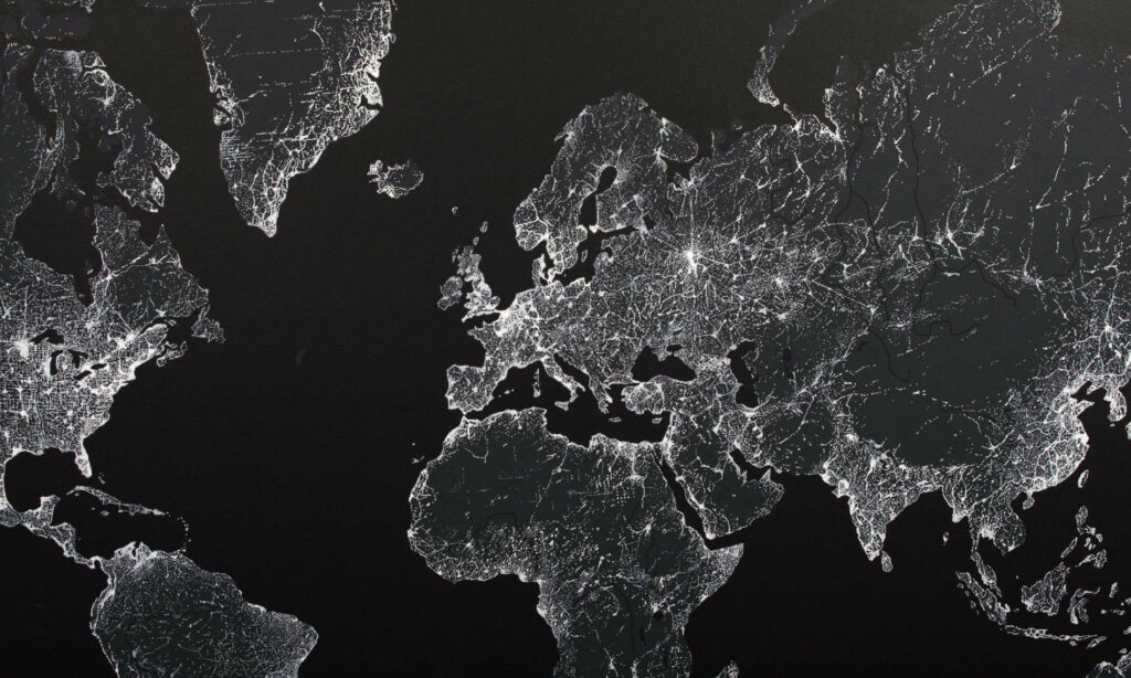Yes We Cartes nocturnes du monde recouvert d'un urbanisme lumineux galopant